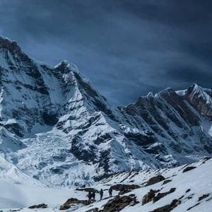 Illustration of a person looking for a job on a giant smartphone